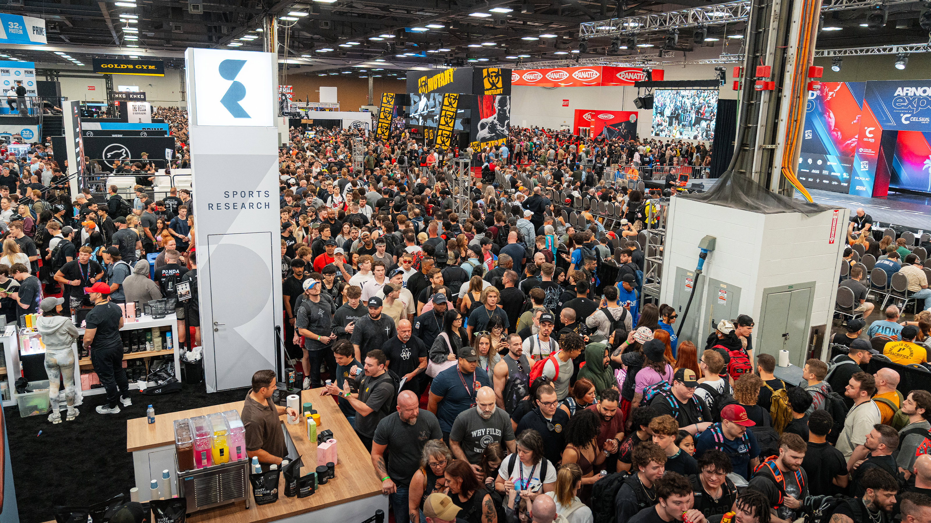 Arnold expo floor crowd across a full festival day